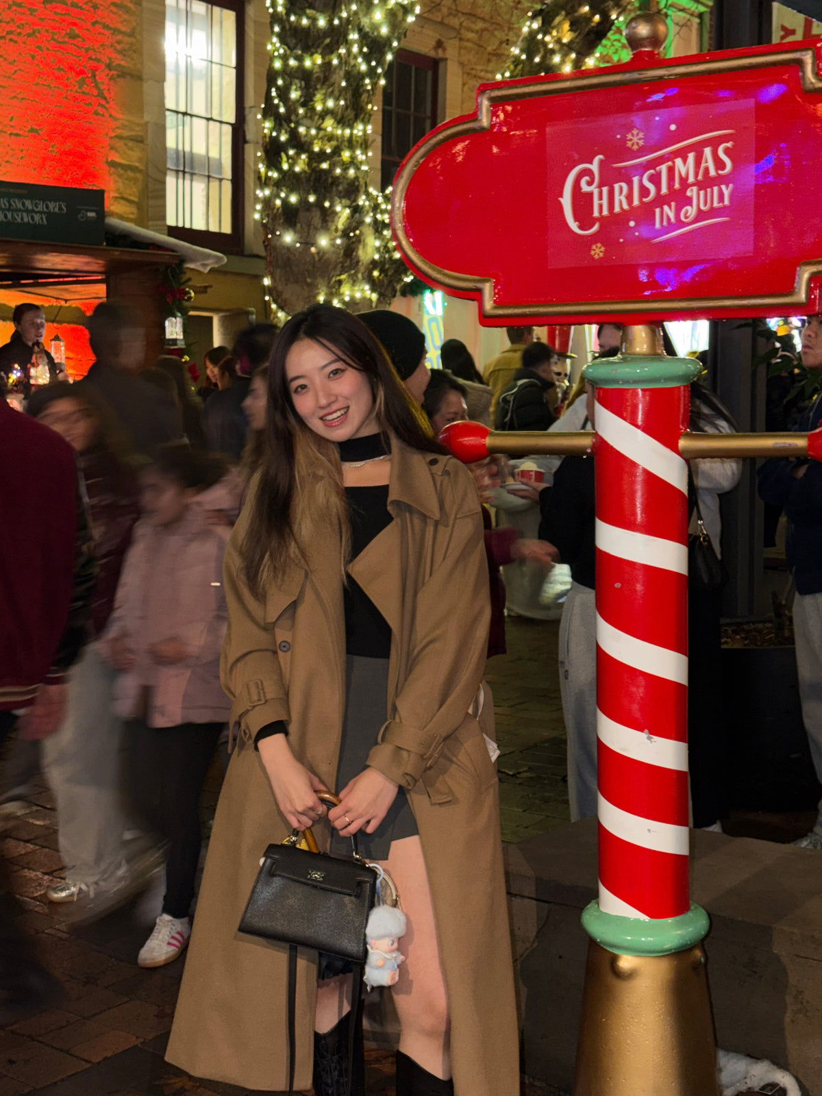 A rainy city night meets timeless trench-coat style.